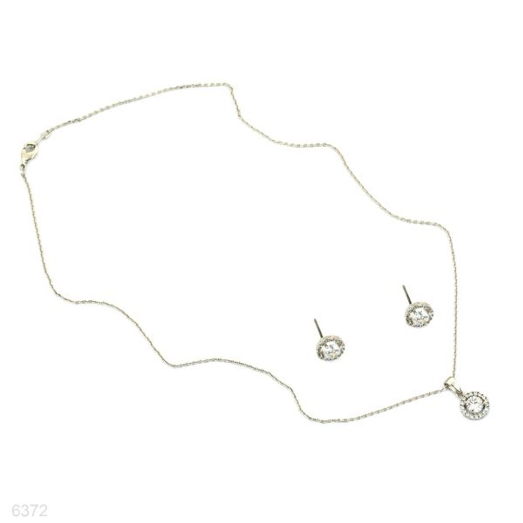 delicate solitaire pendant set