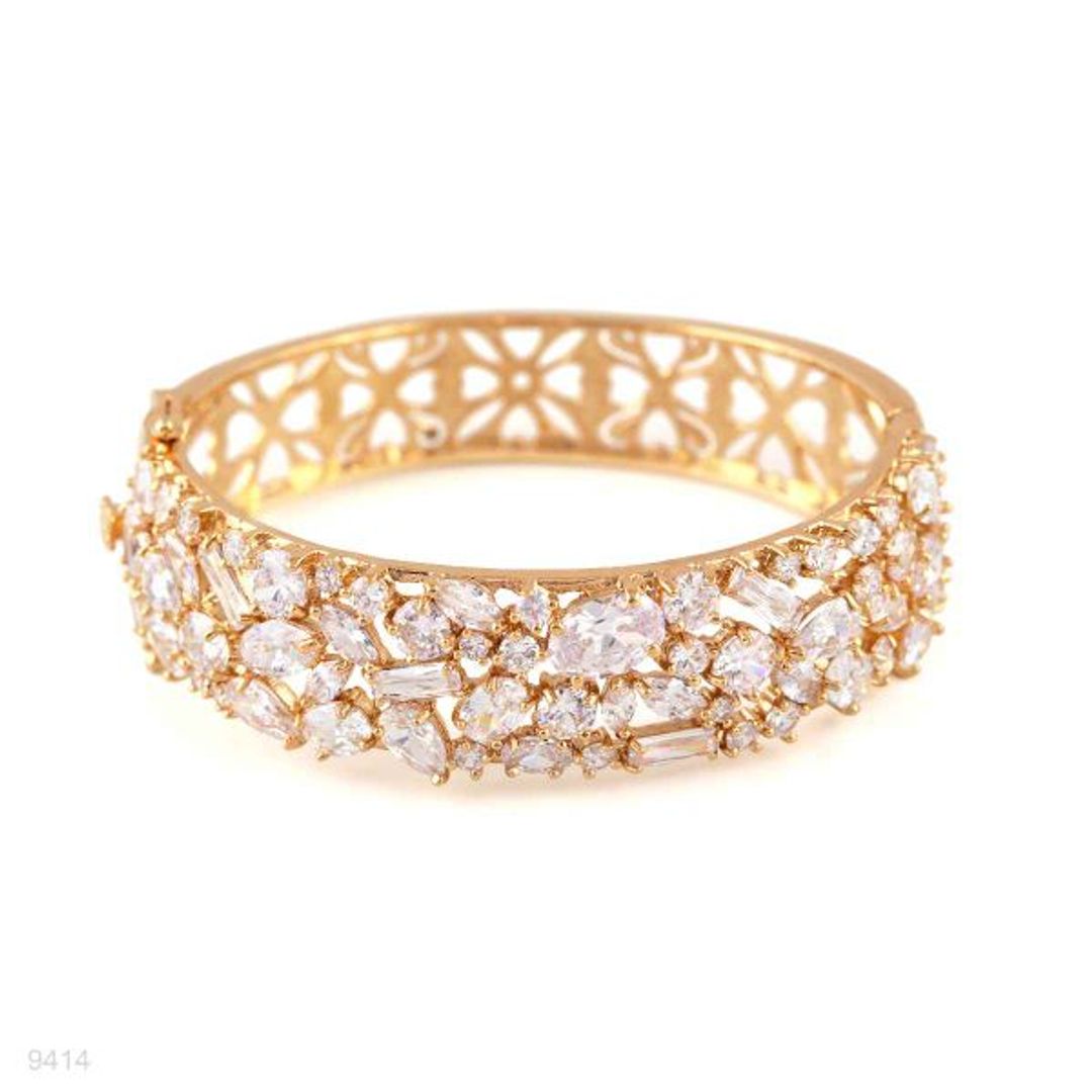 exquisite shimmering thick gold bracelet