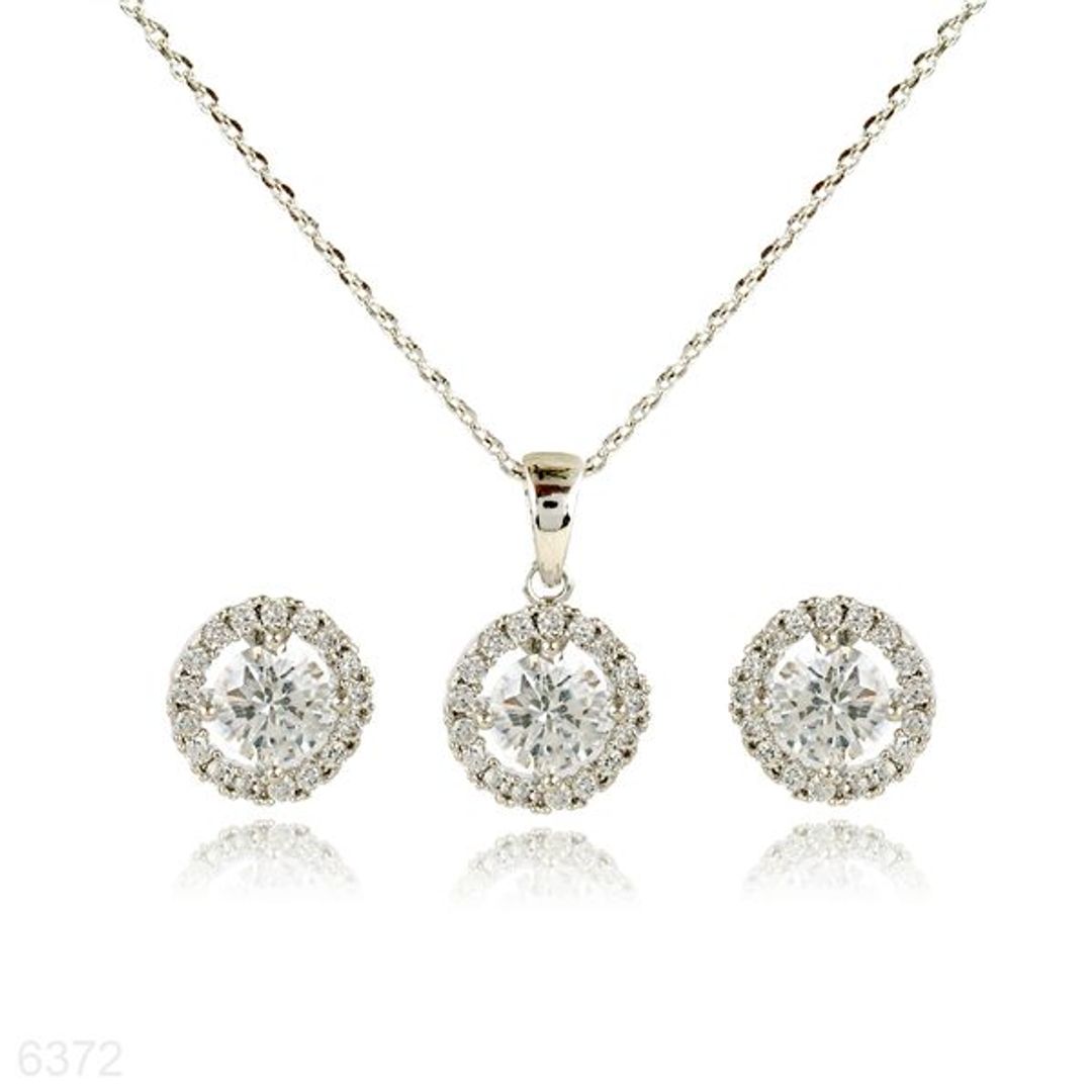 delicate solitaire pendant set